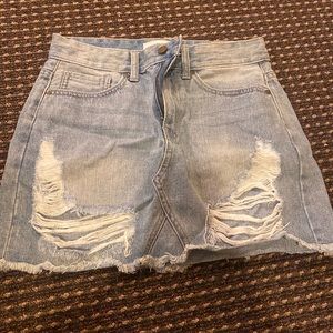 JBD blue ripped denim jean skirt. Size small.